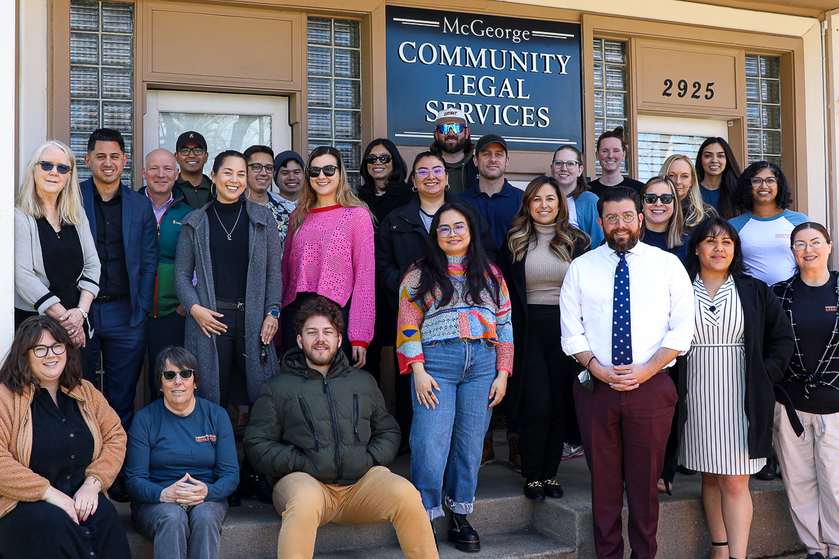 law students in front of the McGeorge Legal Services building