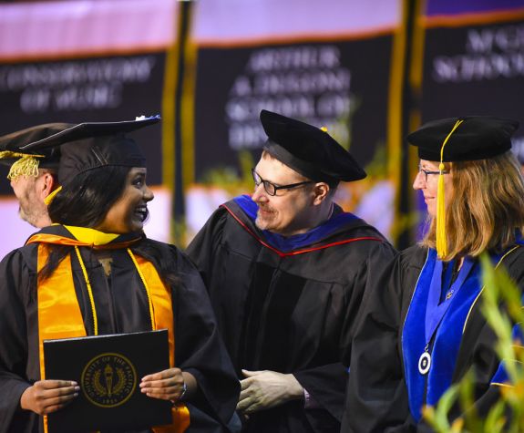 diploma and hooding ceremony