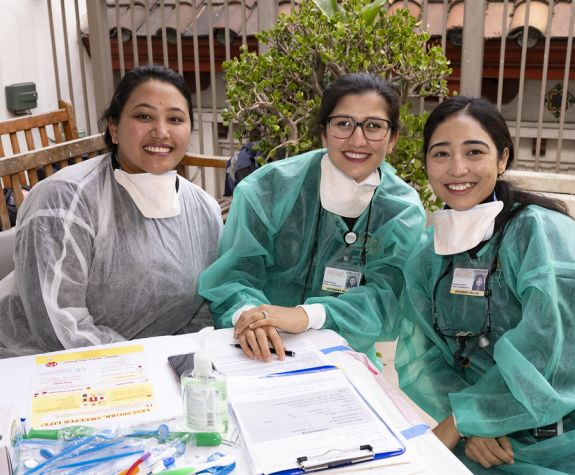 SCOPE volunteers at a table