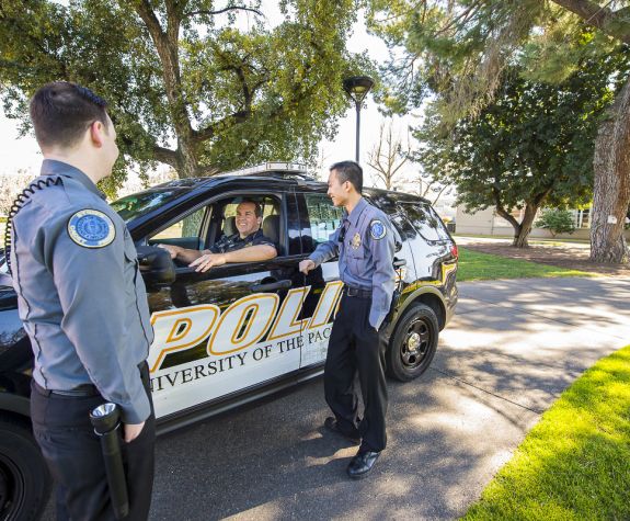 public safety officers outside in the car