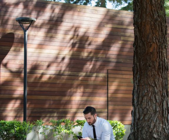 a man looks at his phone