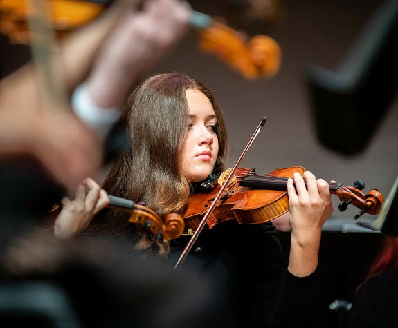 student playing violin