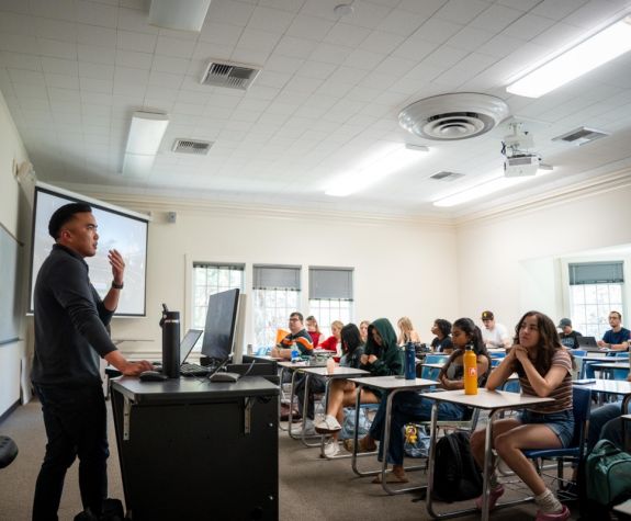Nate Racela speaks to an Intercultural Communications class 