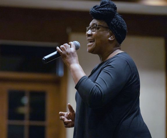 Vocalist perfroming with a microphone