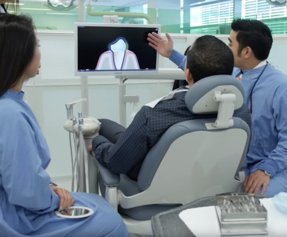 clinic with patient and dentist