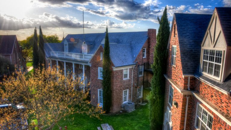 sunflare over fraternity buildings
