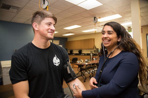Student wearing stethoscope