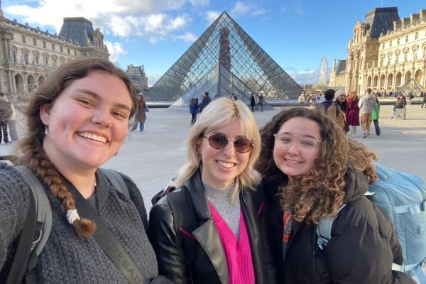 group of students in front of the Louvre in Paris