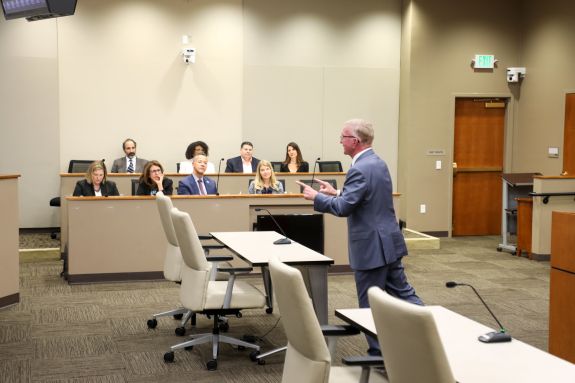 Speaker engaging with students.