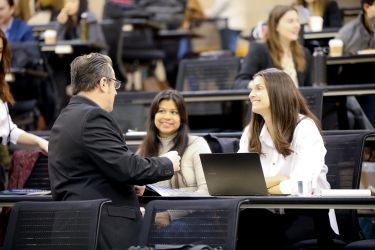 Students speaking with an attorney.