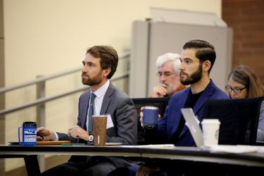 Students listening attentively.