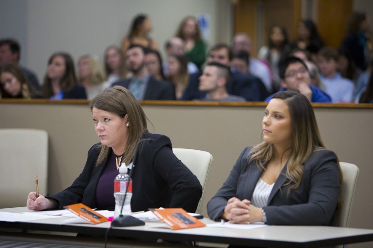 two students attentive during the 2018 final four