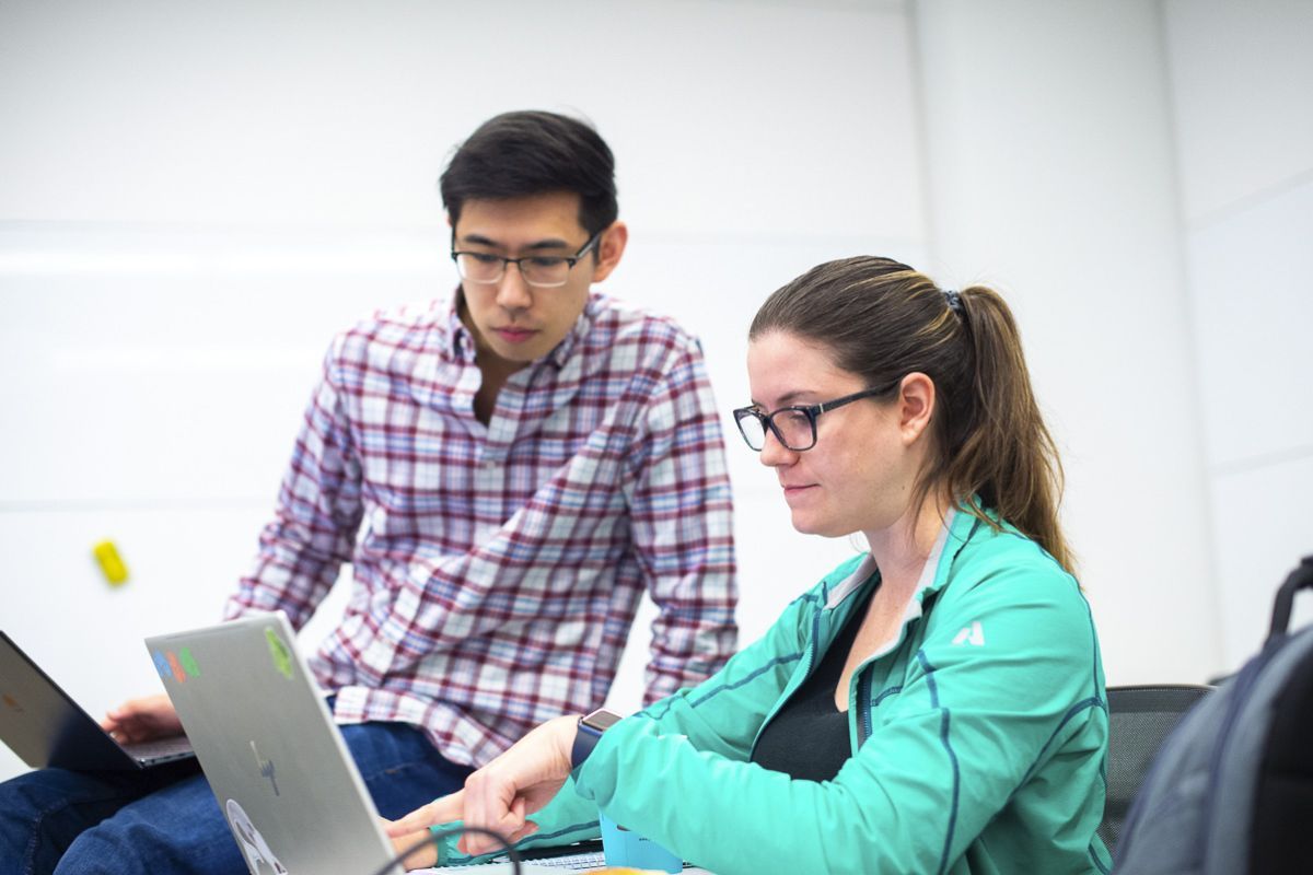 students at laptop