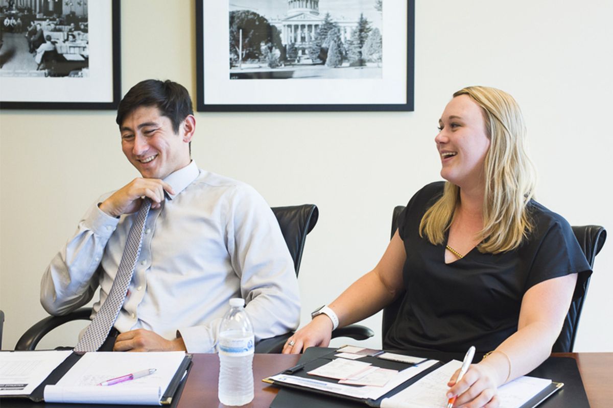 Sarah Gamble and Alex Giannini, students participating in SacSum, meet with Chris Micheli of Aprea & Micheli, a government relations firm in Sacramento, June 23, 2016.