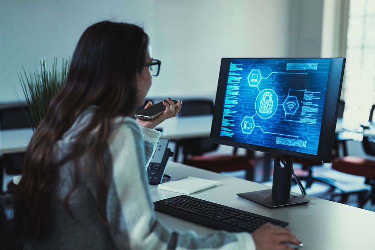 Cybersecurity student working on software systems in class at University of the Pacific