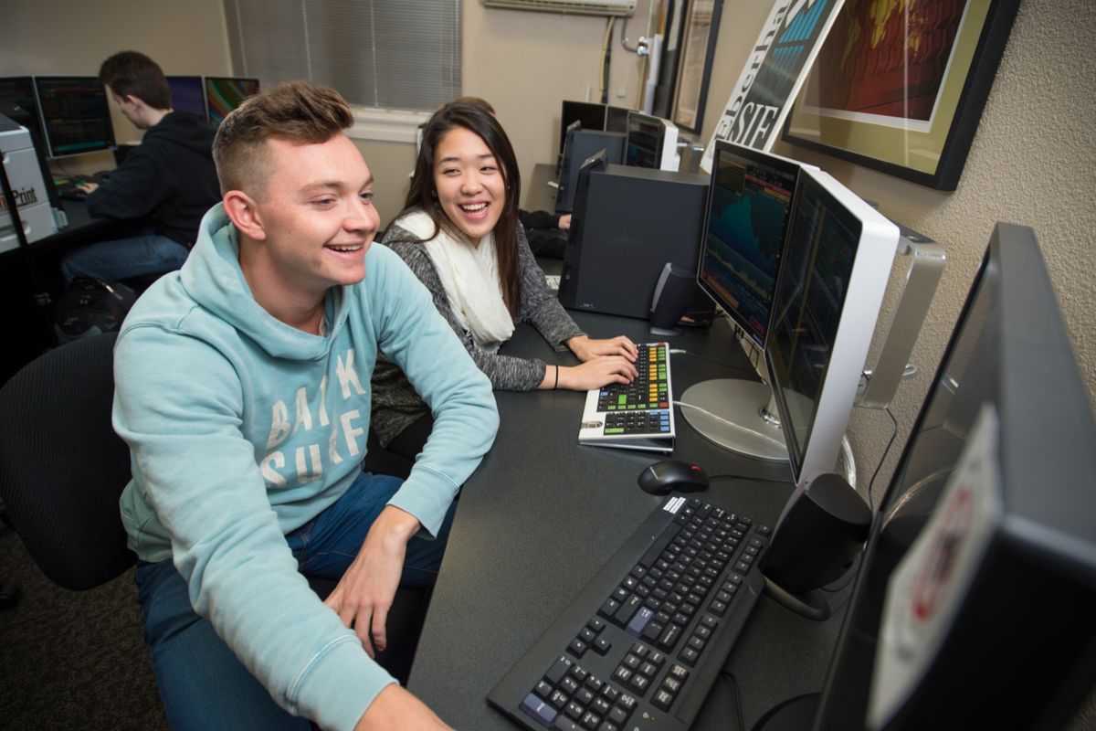 students analyzing data at a computer