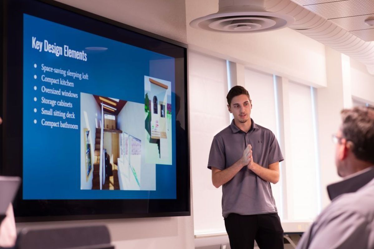 Engineering management student presents project.