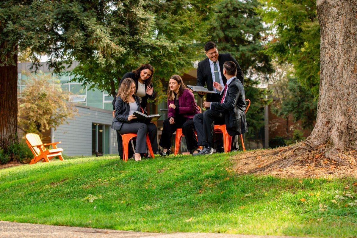 group of students studying on campus