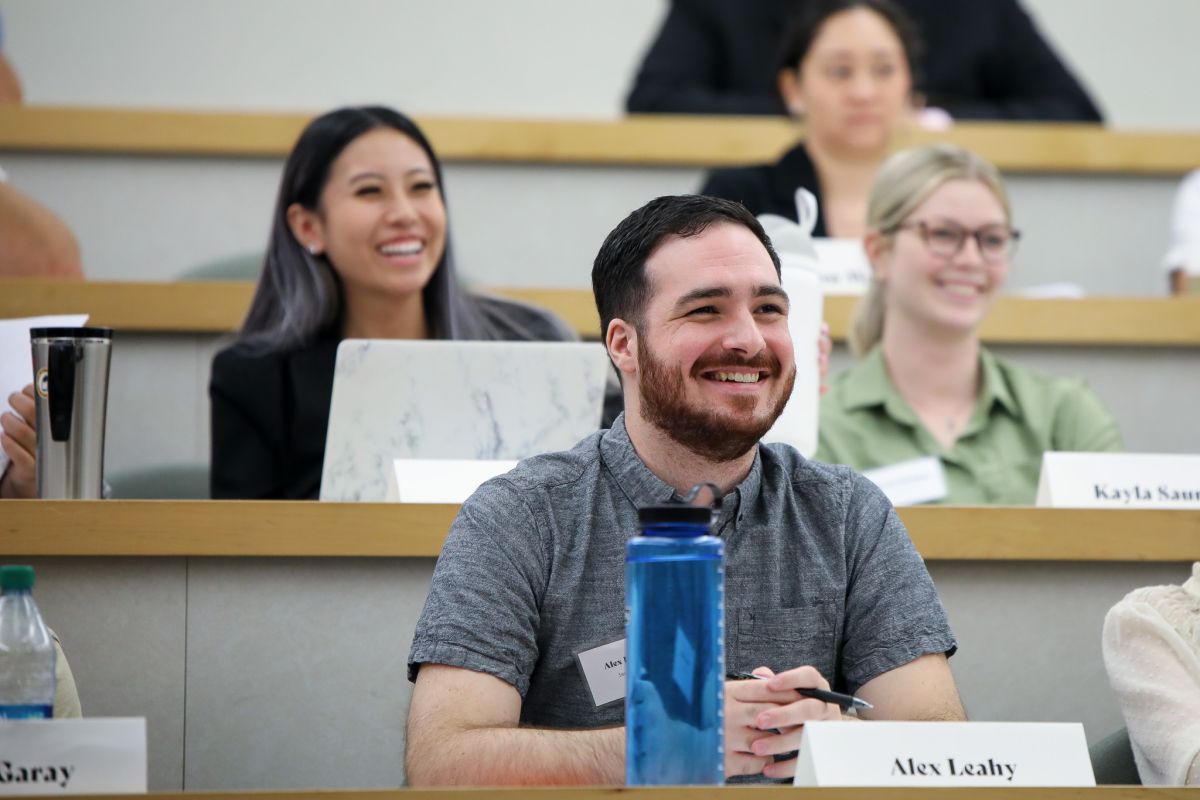 students in classroom smiling