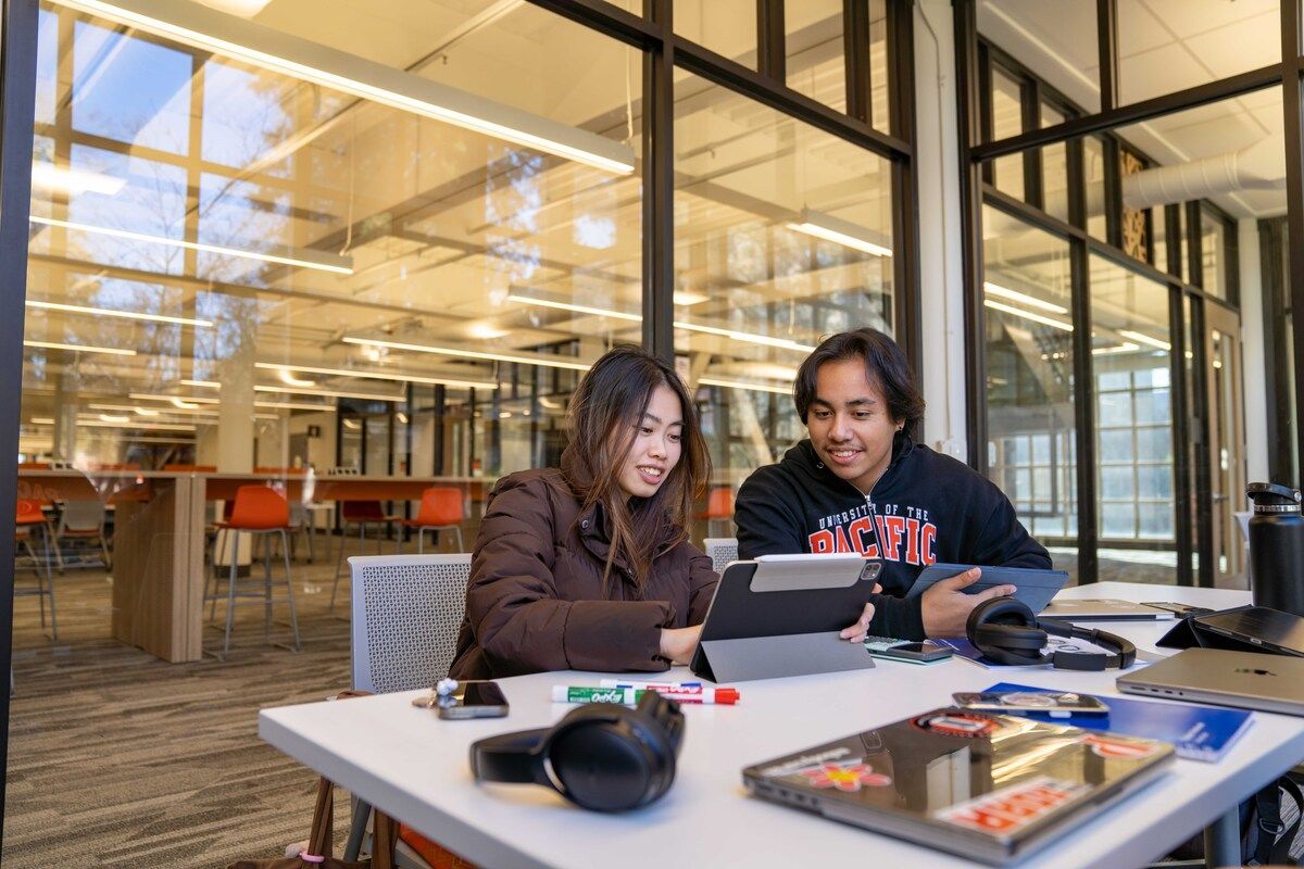 students studying together in the library