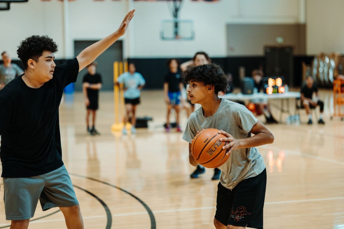 A basketball about to go in the net