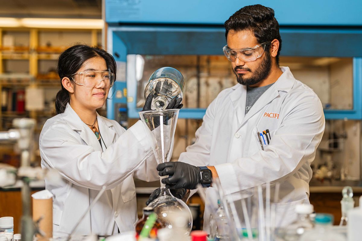 Two students working in a research lab