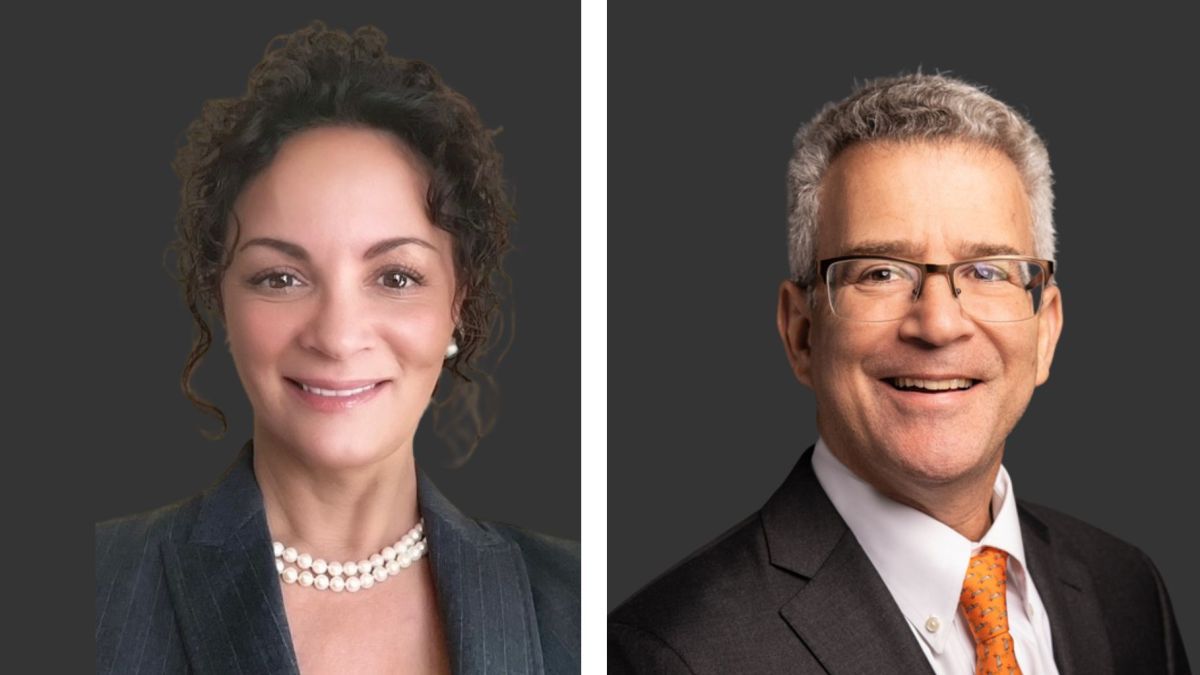 headshots of a woman and man in front of a grey background