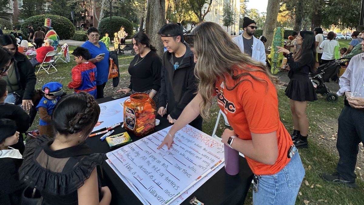 Students tabling at Pacific Trick or Treat 