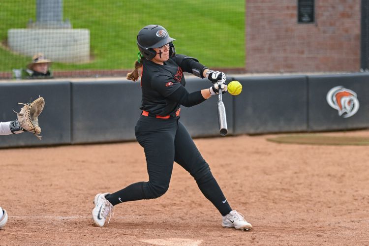 Softball player Amanda Bricker is now a student in the same speech-language pathology program that helped her as a child.