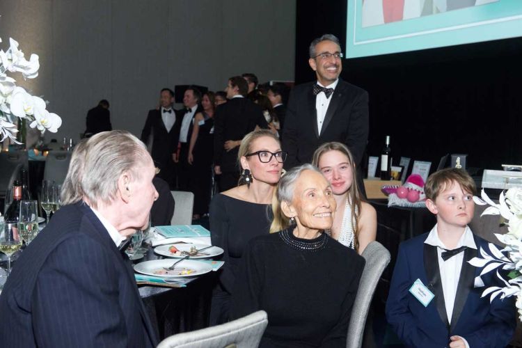 at the KITK event, Dean Nadershahi in the background