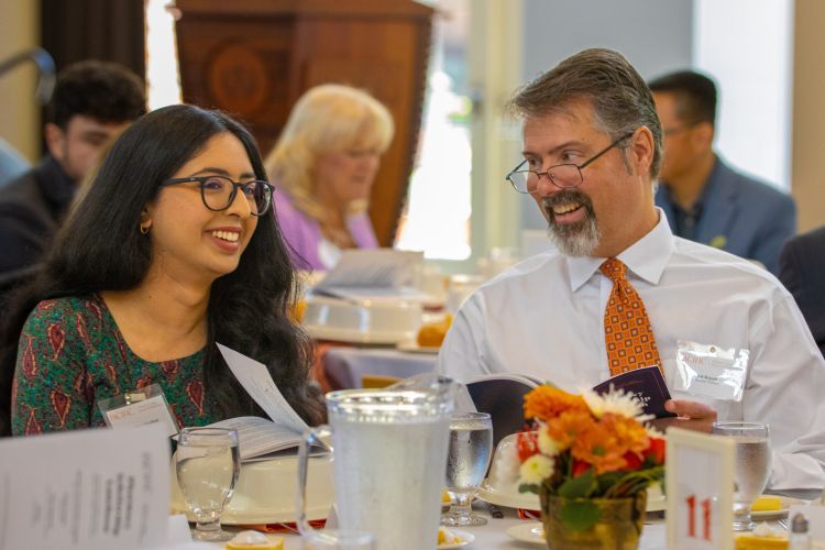 Dr. Ed Rogan with student at Scholarship Luncheon