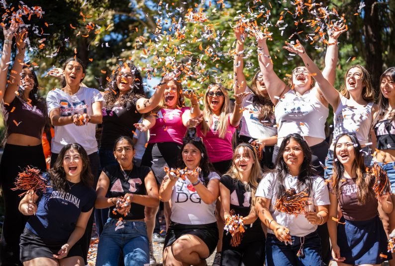 Group of students cheering
