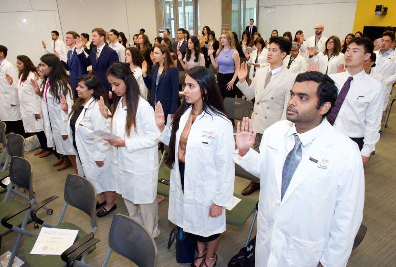 PRIMED participants taking science oath