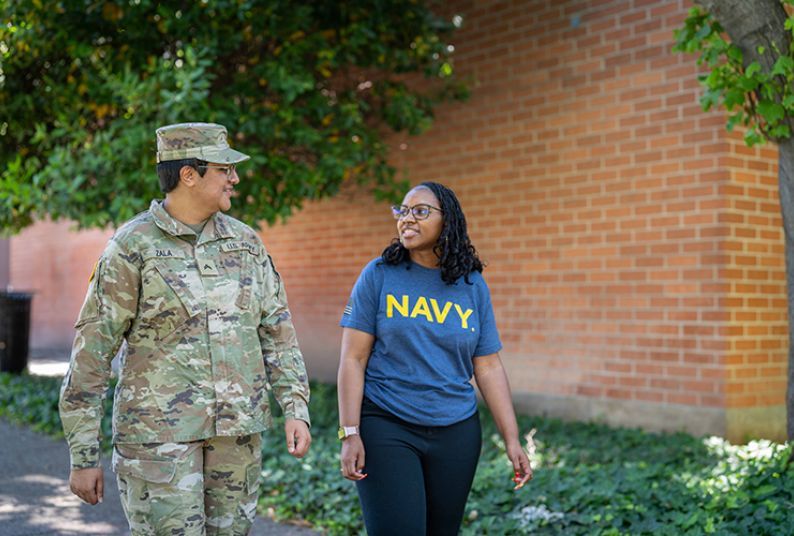 Veteran students having a conversation on the pharmacy campus