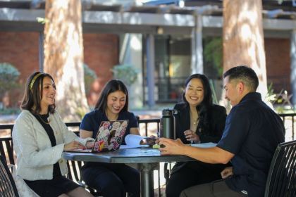 Students study together at the Sacramento Campus gazebo