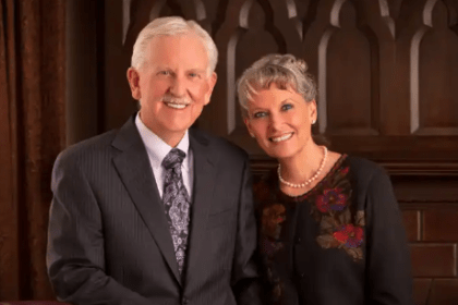 Arthur Eugene Franks '71 and wife Victoria smiling.