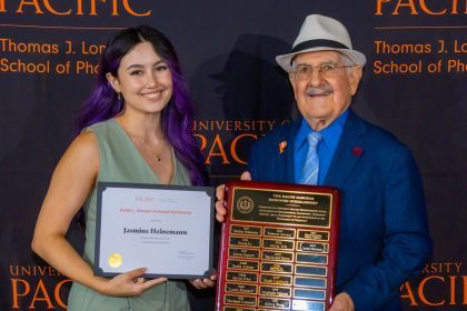 Ralph Saroyan with scholarship recipient Jasmine Heinemann ’23, PharmD