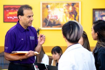 Professor Rajul Arvind Patel ’01, ’06, PharmD, PhD with students
