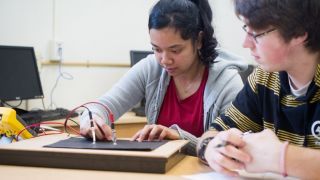 2 students with ee table