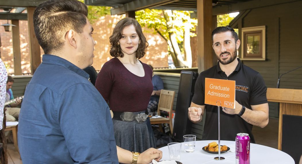 Students meet with Graduate Admission at an on-campus Open House.