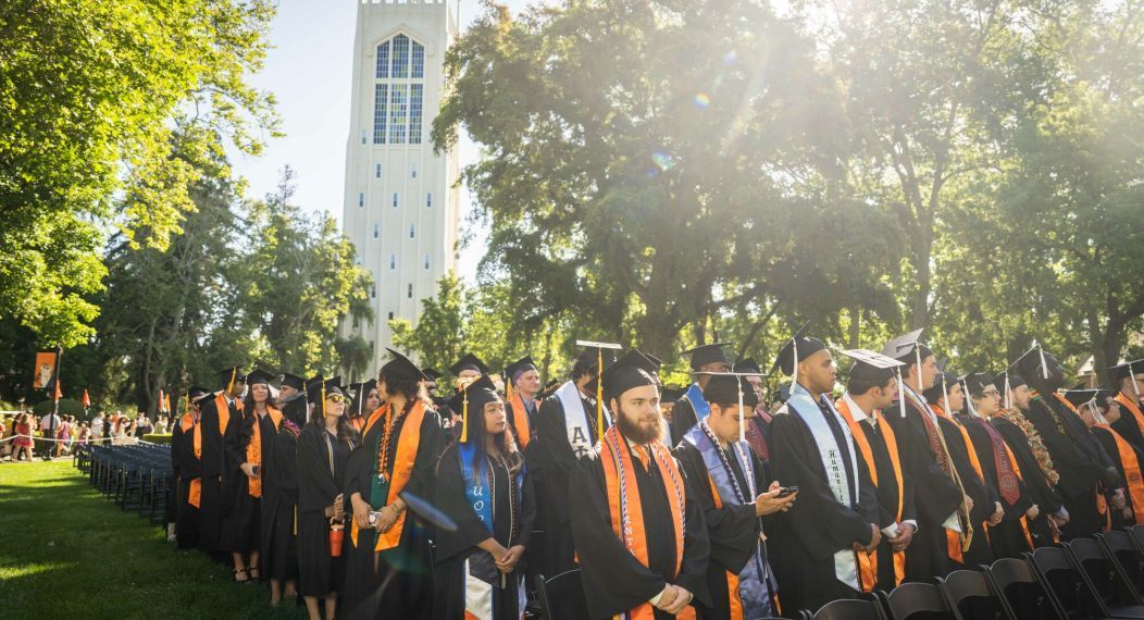 graduates wearing cords at graduation