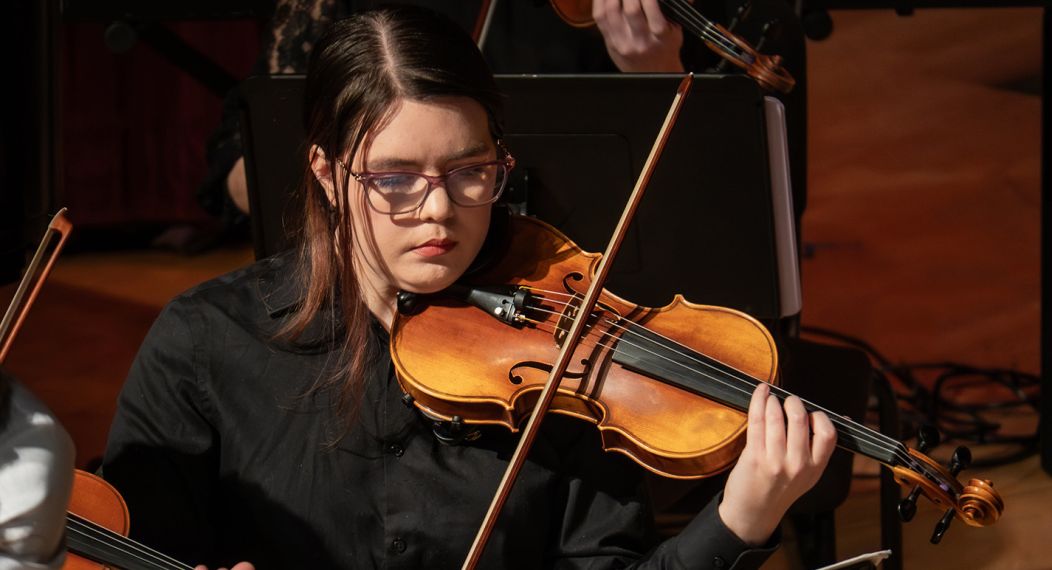 Student playing the violin