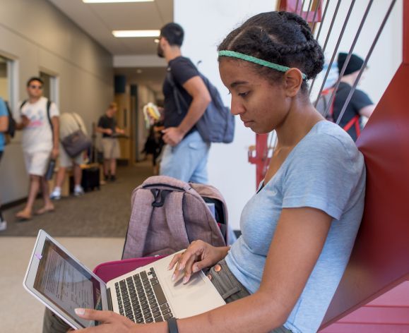 student using laptop