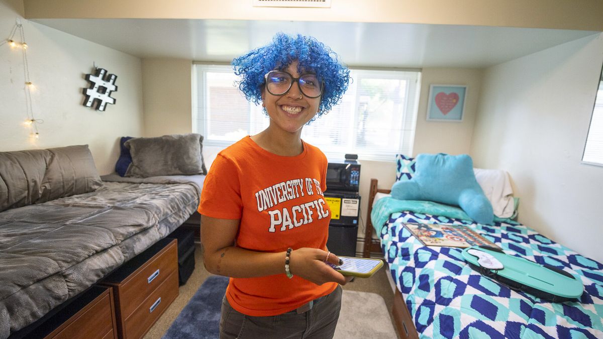 student in dorm room