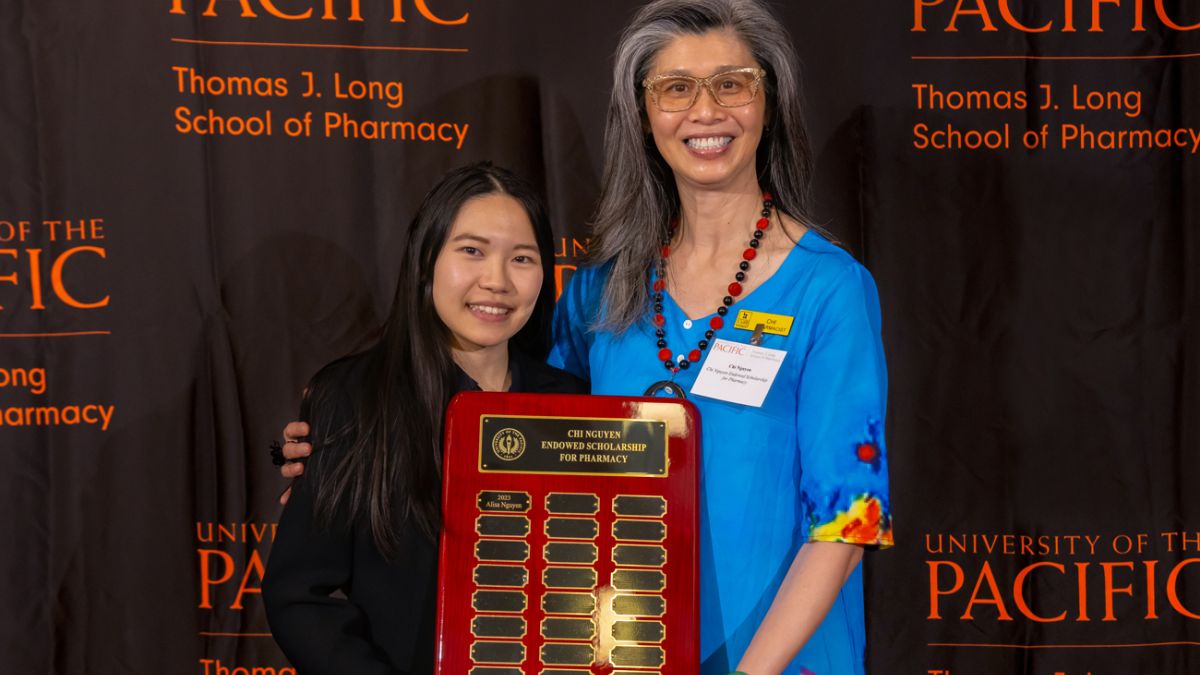 Alumni donor Chi Nguyen with PharmD student scholarship recipient