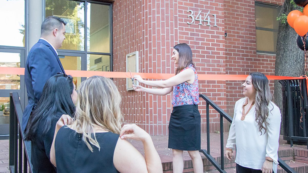 A ribbon-cutting takes place for the new Benerd College