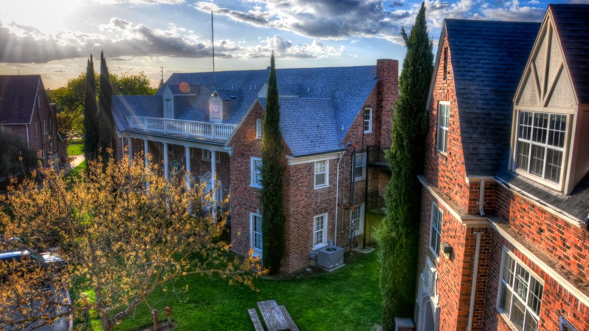 sunflare over fraternity buildings