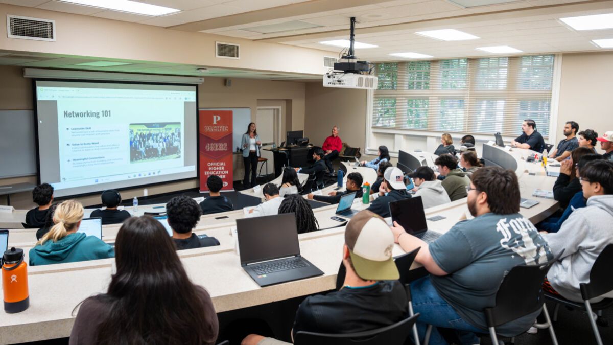 49ers Senior Director of People Operations Emily Bird speaks to a Pacific class
