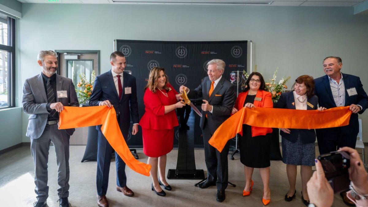 Pacific President Christopher Callahan and others at Physician Assistant building ribbon cutting ceremony. 