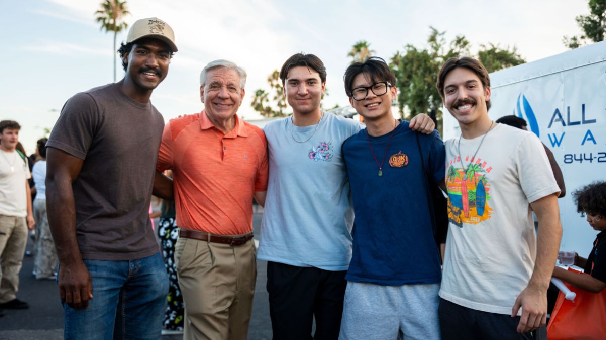 President Christopher Callahan with Pacific students. 